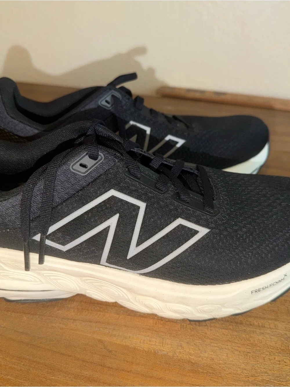 New Balance Men’s Black Athletic Shoes with White Midsole